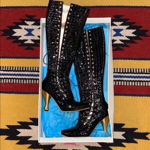 John Fluevog Black Croc Embossed “The Business” Lace up Boots with Gold Heel.